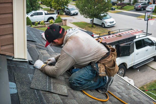 Professional Flat Roof Repair technician working in Moody, ME